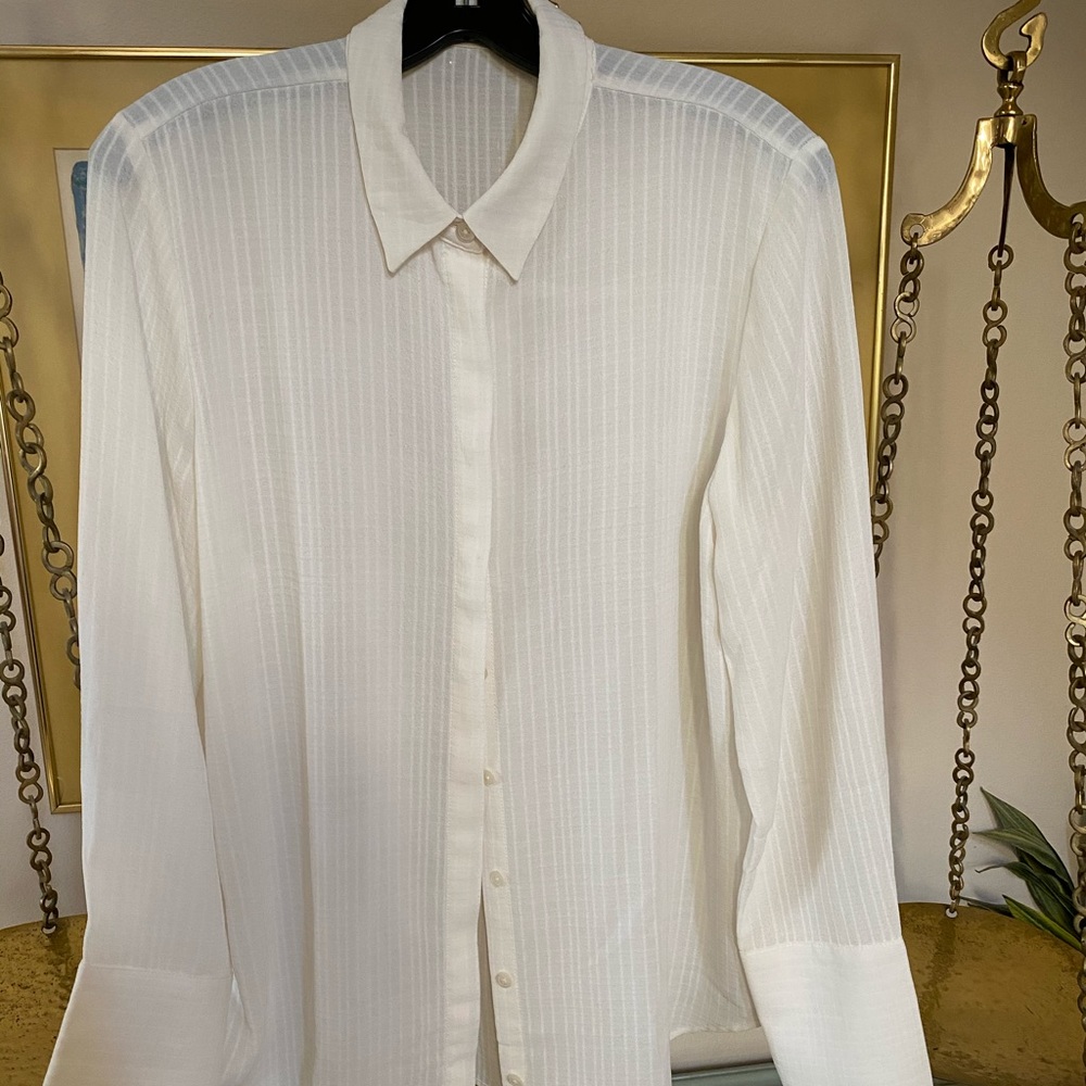 Two tops, one from Chicos, one is Izod.
